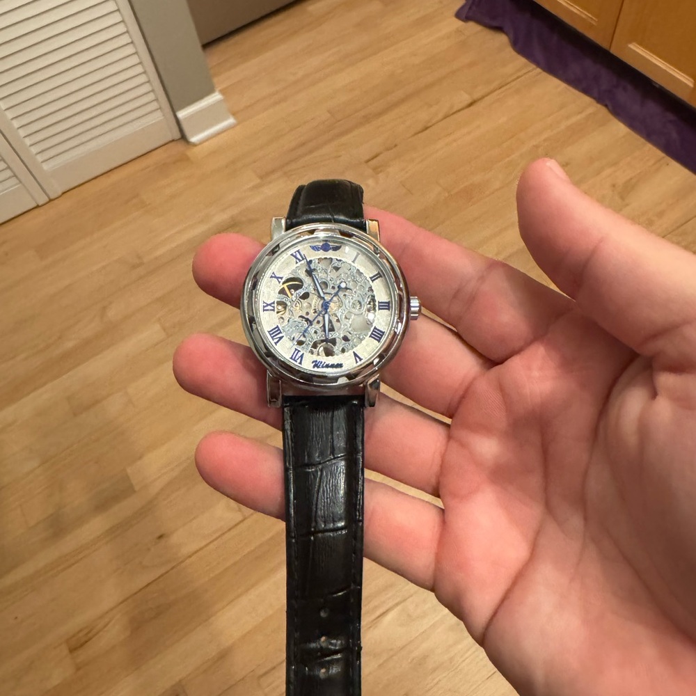 Men’s hand-wind skeleton-style “Winner” mechanical watch